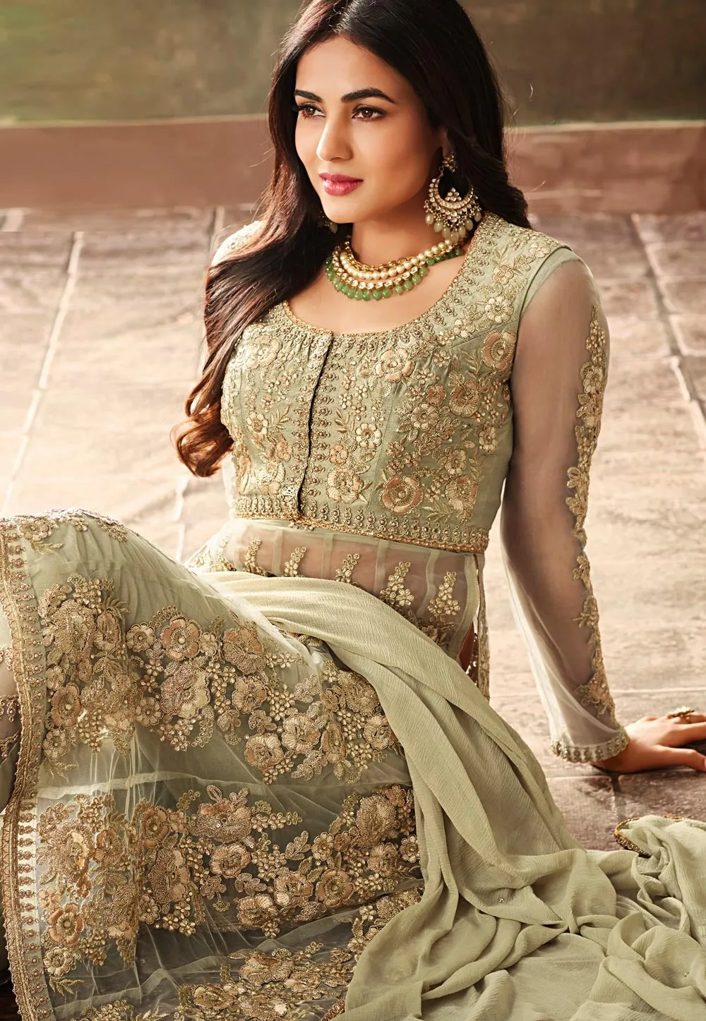 Light Green Net Embroidered Kurta And Pant Suit